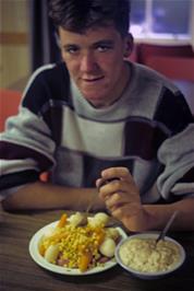 Michael Hall prepares to eat his meal at Garramore YH