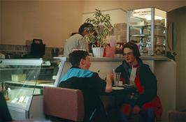 Paul Smith and Simon Hopper enjoy the cafe at Mevagissey, a treat missed by Neil and Martin who got rather wet waiting for us nearby [New scan, July 2019. Kodachrome 200 film]