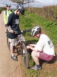 Brake adjustments by engineer Olly at Bramble Oak Cross near Denbury