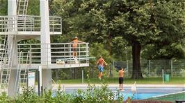 Local children jumping and diving at Aue Sports Centre, Baden, beside Route 5, 9.4 miles into the ride