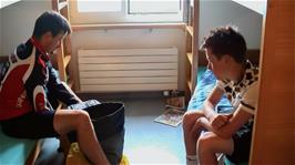 Tao last with packing again in our small room at Rorschach See Youth Hostel