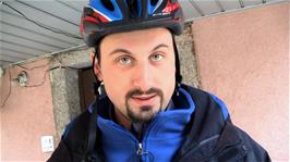 Tao explains how we won't be able to record any video footage today as we ride up two passes because of the rain