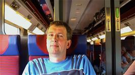 Michael, keeping a close eye on Joe who is having fun with the camcorder on the 09:22 train from Lausanne to Paris