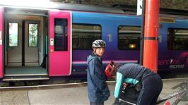 Group 1 put panniers on their bikes at Oxenholme station while we wait for Group 2 to arrive