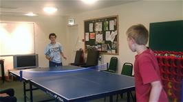 Freddie tries to prove his superiority at Table Tennis in the games room at Borrowdale Youth Hostel