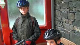 Sam declares he isn't cycling in the weather, as it tips down at Buttermere Youth Hostel