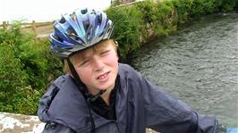 Olly describes how he feels after riding through all the rain this morning, at Santon Bridge, 25.8 miles from the hostel