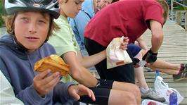 Henry tucks into his second course while Freddie eats his £2 fudge at Coniston Landing