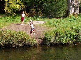 Sam watches while Freddie jumps into the Dart